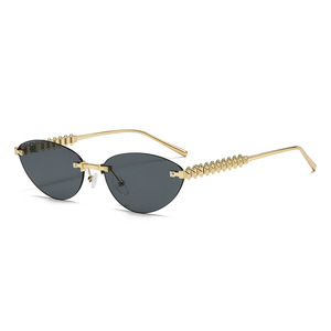 Nouvelle mode lunettes de soleil œil de chat pour hommes femmes Internet célébrités Style Orange cadre Tac métal Rivet jambe lunettes de soleil sans cadre - Product Image 1