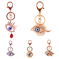 Nouveau Style de porte-clés en métal avec strass mauvais œil, accessoires de voiture, cadeaux promotionnels pour les consommateurs