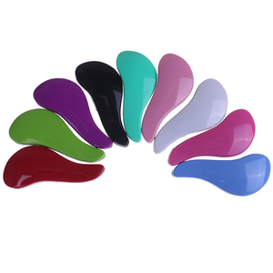 Brosse à cheveux démêlante pour femmes, poils humides/secs, poignée en plastique, peigne portable. - Product Image 1