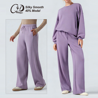 Ensemble de vêtements de sport avec pantalon droit décontracté à taille mi-haute en tissu modal soyeux et lisse, avec cordon de serrage, poches et manches longues à col rond