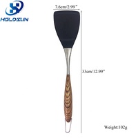 Spatule à fentes en silicone résistante à la chaleur de style moderne avec manche en acier inoxydable durable et revêtement en bois pour la cuisine domestique