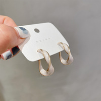 2025 boucles d'oreilles en gros en cristal pour femmes 2021 boucles d'oreilles torsadées plaquées or