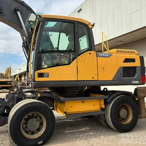 Excavatrice sur pneus Volvo EW180 d'occasion de haute qualité avec moteur central et composants de pompe en bon état - Product Image 1