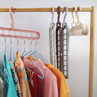 Offre Spéciale 9 trous Étonnant Magique Pliable Vêtements Cintres Gain de place De Stockage Organisateur de Cintre En Plastique