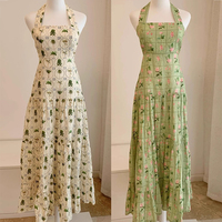 Gaun tanpa lengan Motif temperamen manis wanita musim panas gaya Eropa dan Amerika kustom gaun pantai leher Halter seksi rok A-line