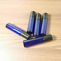 Vente en gros de flacons en verre ronds bleus vides de 10 ml pour huiles essentielles avec bille roulante en métal