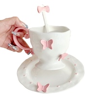 Tasse à café en céramique avec soucoupe et base sur pied, motif floral nœud papillon, luxueuse, visuellement époustouflante, emballage en boîte cartonnée