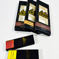 Boîtes d'emballage personnalisées noires et dorées en gros avec impression étoilée et fenêtre découpée pour bougies de massage et chocolats gourmands