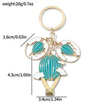 Lot de porte-clés personnalisés en forme de montgolfière bleue, breloques nuage émaillées, anneau en métal doré, souvenir de voyage personnalisé, vente en gros