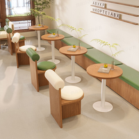 Ensemble de mobilier de café : Table ronde en bois, chaise rembourrée avec appui-tête à roulettes, banquette murale pour salon de thé