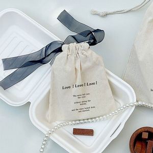 Wholesale Eco-Friendly Recycled Cotton <b>Canvas</b> Drawstring Dust Bag Recyclable Gift Jewelry Packaging Bag Pouch With Silk Ribbons - Product Image 1