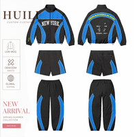 Ensemble pantalon large et coupe-vent bleu à blocs de couleur personnalisés, séchage rapide, collection automne 2026 Huili pour hommes - Fournisseur ODM OEM