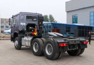 Camion tracteur HOWO-7 6X4 500HP Diesel <span class=keywords><strong>Euro</strong></span> <span class=keywords><strong>2</strong></span> d'occasion avec cabine à toit plat, climatisation et caméra arrière pour le transport d'engins - Product Image 3