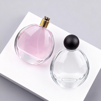 Vente en gros d'usine 30 50 80ml Flacons de parfum de luxe en verre cosmétique Flacons vides sphériques transparents avec bouchon à bille