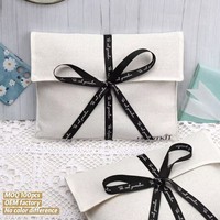 Enveloppe en jute blanche imprimée avec logo personnalisé réutilisable Sac à poussière pochette enveloppe en jute organique à fond rond Sacs à poussière
