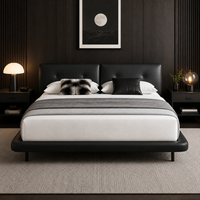 Modernes, umweltfreundliches Plattformbett mit schwarzem Echtlederbezug, Holzrahmen, gepolstertem Kopfteil und schlanken Beinen