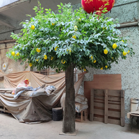 Hojas verdes casi naturales Flores blancas Árbol artificial del baniano Plantas verdes falsas Árbol falso decorativo
