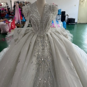 <span class=keywords><strong>Robe</strong></span> <span class=keywords><strong>de</strong></span> <span class=keywords><strong>mariée</strong></span> <span class=keywords><strong>de</strong></span> luxe Mc023 en tulle perlé et pailleté, coupe princesse, décolleté en V profond, grand nœud, traîne cathédrale, Jancember - Product Image 2