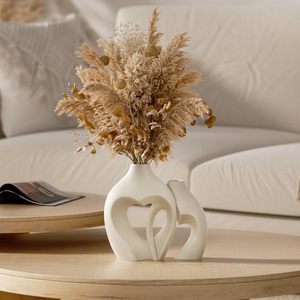 Set <span class=keywords><strong>di</strong></span> vasi <span class=keywords><strong>in</strong></span> porcellana nordica minimalista <span class=keywords><strong>in</strong></span> <span class=keywords><strong>ceramica</strong></span> bianca a forma <span class=keywords><strong>di</strong></span> cuore per matrimonio da salotto <span class=keywords><strong>centrotavola</strong></span> decorativa con smalto opaco - Product Image 6