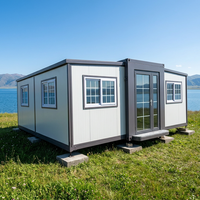 Maison modulaire préfabriquée de luxe à double aile extensible, conteneur habitable 2 chambres, cabine de vie portable, bureau mobile