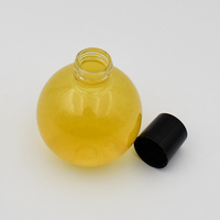 Couleur personnalisée 100ml 3oz en plastique PET de qualité alimentaire Sphère en forme de boule Conteneurs de bouteilles de liquide de jus avec bouchons à vis Couvercles pour la fête