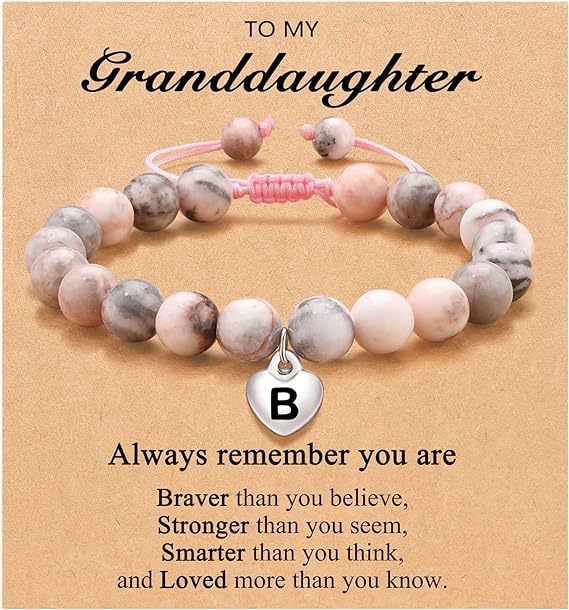 Pulsera rosa tejida con cebra y letra b