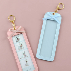 Korean style PU <b>leather</b> pet photo <b>keychain</b>, cute long four-grid DIY photo clip, couple photo pendant - Product Image 1