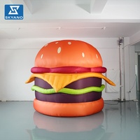 Modèle d'art gonflable personnalisé en forme de hamburger de dessin animé pour la décoration d'événements de festivals culinaires en plein air