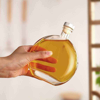 Vente en gros de bouteilles en verre sphériques transparentes de 250 ml et 500 ml pour jus/bière/boissons/alcool avec couvercles