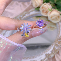 Cincin kecemasan bergerak berputar tangan berlapis emas Super Flash tembaga yang dirancang Niche pengeluaran warna terbuka Zircon bunga