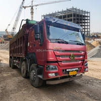 Camion benne diesel Howo 6x4 d'occasion remis à neuf, 40 tonnes, conduite à gauche, boîte de vitesses 10 rapports, origine Chine