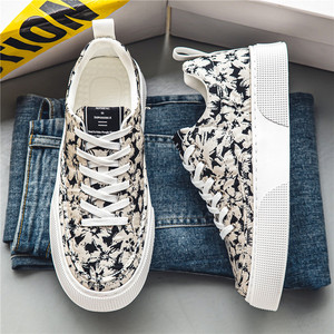Baskets basses en toile pour hommes, imprimé léopard noir et beige, semelle plateforme épaisse blanche, à lacets, style streetwear décontracté - Product Image 1