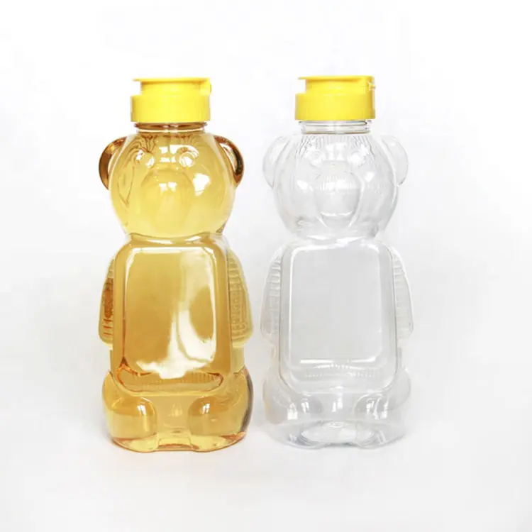 फ्लिप-टॉप कैप्स के साथ 330 ग्राम 500 ग्राम उच्च गुणवत्ता वाले पेय जूस सॉस पीईटी स्क्वीज़ भालू के आकार की प्लास्टिक शहद की बोतलें अनुकूलित करें