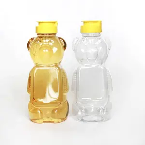 Özelleştirmek 330g 500g yüksek kaliteli içecek suyu sos PET sıkmak ayı şekilli plastik bal şişeleri ile Flip-Top Caps