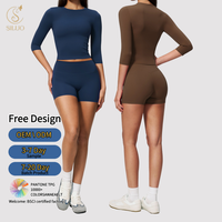 Nouvel ensemble de sport pour femme : haut respirant à séchage rapide et short taille haute pour le yoga et la gym, tenue de fitness sculptante