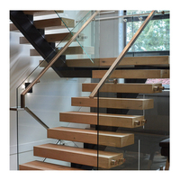 Escalier flottant préfabriqué moderne en acier au carbone à poutre unique avec marches en bois de hêtre et chêne, garde-corps en verre, durable, pour hall de villa, usage intérieur