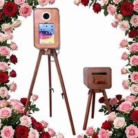 Photomaton rétro classique compatible avec les appareils photo reflex numériques et les iPad, adapté aux mariages et aux événements.