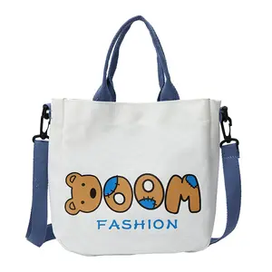 2021 new design fashion trends women's canvas portable change casual tote handbag