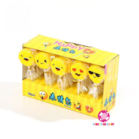 Fabricant Chinois Halal Sucette Fruit Aromatisé Doux Bâton Dur Bonbons Mignon Jaune Sourire Expression Sucette