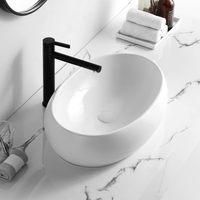 Lavabo ovale moderne à poser sur comptoir en céramique et surface solide avec égouttoir, capacité 9L, facile à nettoyer