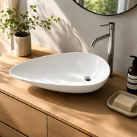 Lavabo Ovale Moderne 750mm Grand Format Asymétrique Effet Galet, Lavabo Céramique Artistique à Poser 120mm à Profil Bas pour Salle de Bain, Projet Hôtelier de Luxe