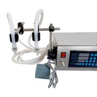 Machine de remplissage CNC compacte à double tête pour la production de spiritueux, d'huiles et de boissons en petites séries