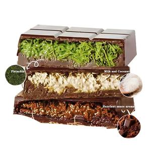 شوكولاتة بالحليب للبيع بالجملة والكميات الكبيرة حلوى وقطع شوكولاتة دبي بحشوة الفستق والبندق وبديل الكاكاو والمربى حاصلة على شهادة حلال - Product Image 4