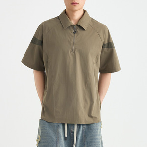 <span class=keywords><strong>เสื้อโปโล</strong></span>ผู้ชายทรงหลวม แขนสั้น สีเขียวล้วน แบบมีซิปครึ่งตัว ผลิตจากผ้าไนลอนผสมสแปนเด็กซ์ แห้งเร็ว รับผลิตตามสั่ง (OEM) พร้อมสกรีนโลโก้ ขายส่ง - Product Image 1