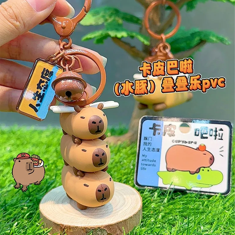 Creativo PVC Animal Capybara juguetes Kawaii Flying Capybara llavero Capymuas juguetes PVC bolsa colgante ornamento