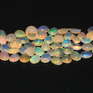 Cabochon éthiopien en opale Welo forme ovale naturelle couleur changeante fabrication de bijoux en agate pierre unie prix de gros par carat - Product Image 6