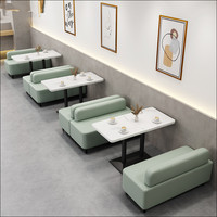 Combinaison moderne de canapé, table et chaises de restaurant de luxe avec structure métallique