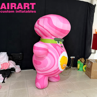 Oignon gonflable rose de dessin animé, adorable image de mascotte gonflable en forme d'oignon