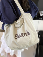 Sac de plage multicolore tendance été 2025 – Sac à bandoulière étanche en polyester avec lettres, style bonbon, pour filles – Sacs de luxe de marque pour femmes