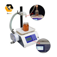 Machine de remplissage semi-automatique pour liquides visqueux, miel, produits apicoles, désinfectant pour les mains / Machine de remplissage de liquides